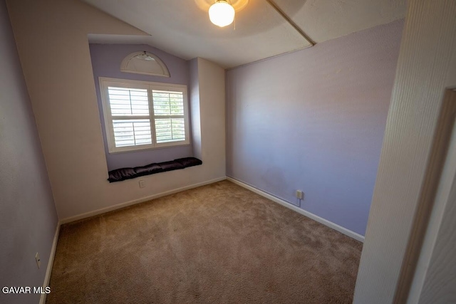 4722 Sungate Dr, Palmdale, CA 93551 - carpeted empty room featuring lofted ceiling and baseboards