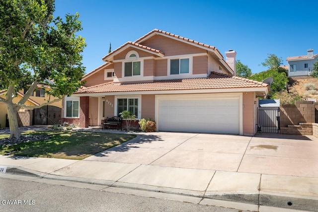 4722 Sungate Dr, Palmdale, CA 93551 - view of front facade with a tiled roof, a gate, concrete driveway, a garage, and a chimney