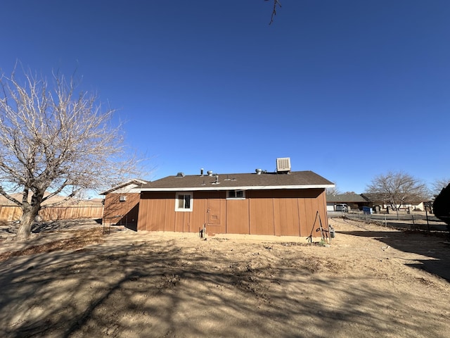 back of house with cooling unit