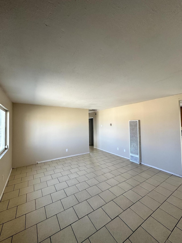 view of tiled spare room