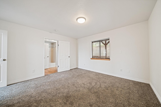 unfurnished bedroom with carpet flooring