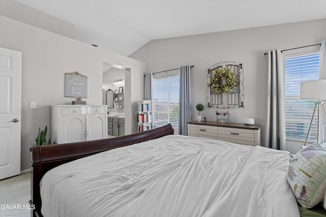 3616 Glenridge Ave, Rosamond, CA 93560 - bedroom with lofted ceiling, light colored carpet, and connected bathroom