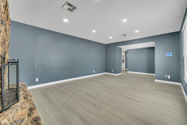 unfurnished living room with light hardwood / wood-style floors