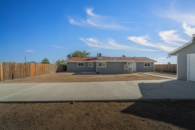 back of house featuring a patio area