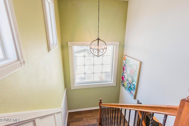 3455 Pine Mist Ct, Rosamond, CA 93560 - stairway with a chandelier, wood finished floors, and healthy amount of natural light