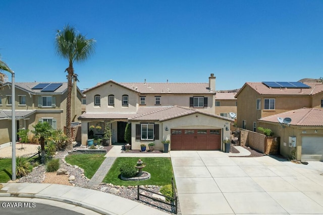 3455 Pine Mist Ct, Rosamond, CA 93560 - mediterranean / spanish house featuring an attached garage, stucco siding, concrete driveway, a tile roof, and a residential view