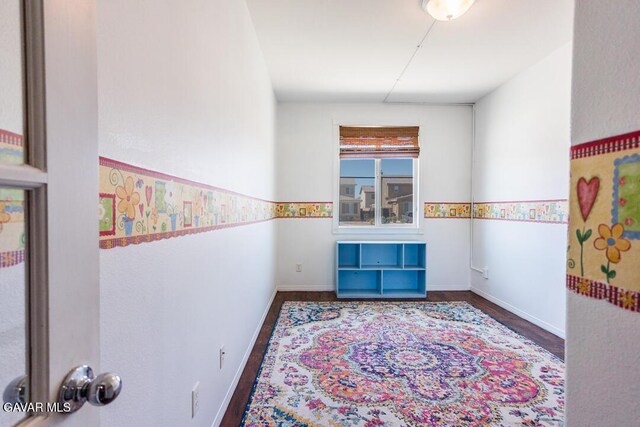 3455 Pine Mist Ct, Rosamond, CA 93560 - hallway featuring wood finished floors