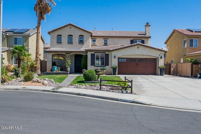 3455 Pine Mist Ct, Rosamond, CA 93560 - mediterranean / spanish home with stucco siding, an attached garage, driveway, a chimney, and a tiled roof