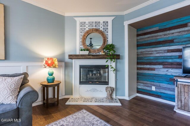 3455 Pine Mist Ct, Rosamond, CA 93560 - living room with a fireplace with raised hearth, wood finished floors, ornamental molding, and ceiling fan