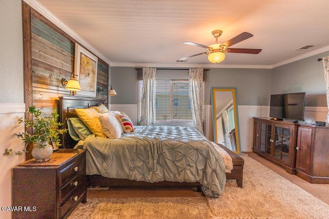 3455 Pine Mist Ct, Rosamond, CA 93560 - carpeted bedroom with crown molding, wainscoting, wood walls, and ceiling fan