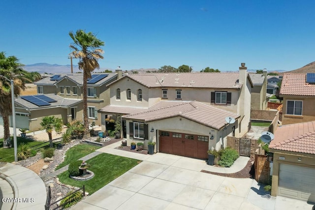 3455 Pine Mist Ct, Rosamond, CA 93560 - view of front facade featuring stucco siding, a residential view, concrete driveway, a tile roof, and an attached garage