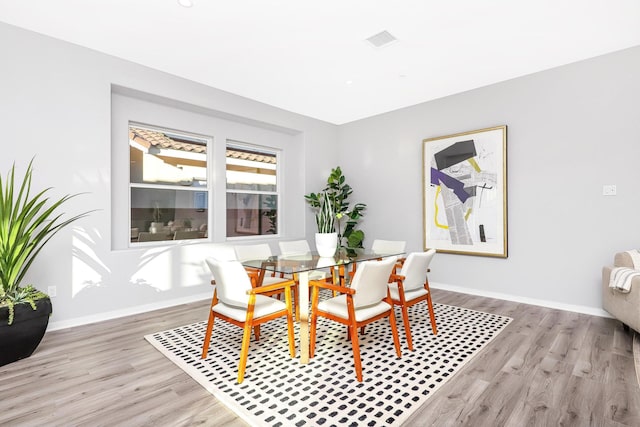 dining area featuring light hardwood / wood-style floors