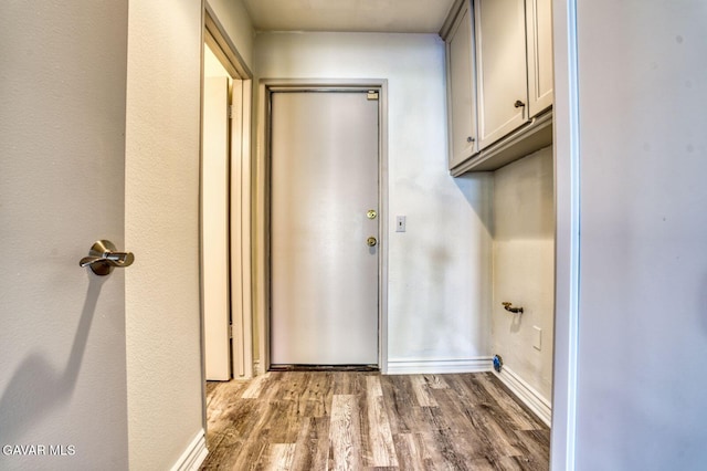 43737 W 27th St, Lancaster, CA 93536 - washroom featuring wood finished floors and baseboards