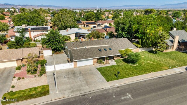 43737 W 27th St, Lancaster, CA 93536 - aerial perspective of suburban area with a mountain backdrop