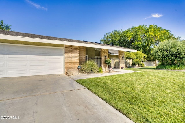 43737 W 27th St, Lancaster, CA 93536 - ranch-style house featuring brick siding, driveway, and a garage