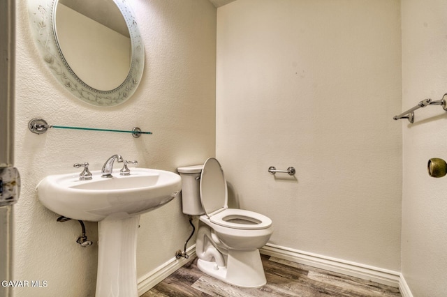 43737 W 27th St, Lancaster, CA 93536 - half bath featuring wood finished floors and toilet