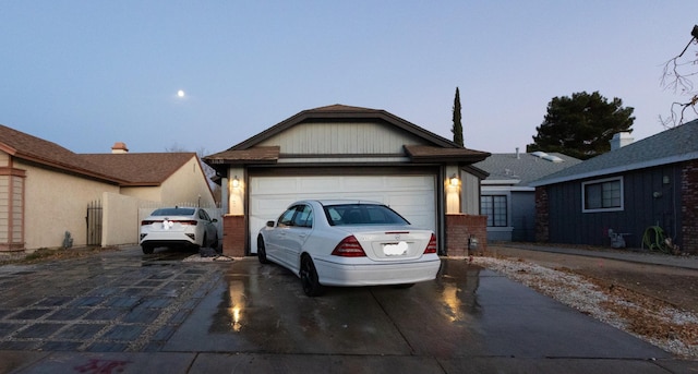 single story home with a garage