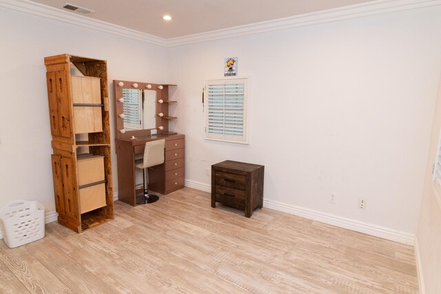 office space with light hardwood / wood-style floors and crown molding