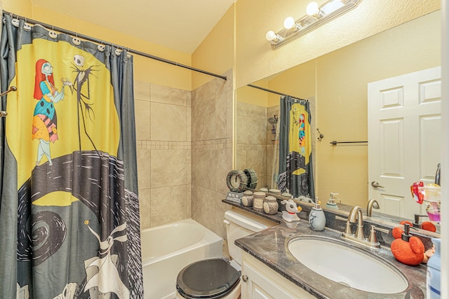 full bathroom featuring toilet, vanity, and shower / bath combination with curtain