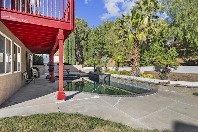 42164 Valley Vista Dr, Lancaster, CA 93536 - view of patio / terrace with a pool with connected hot tub and a fenced backyard