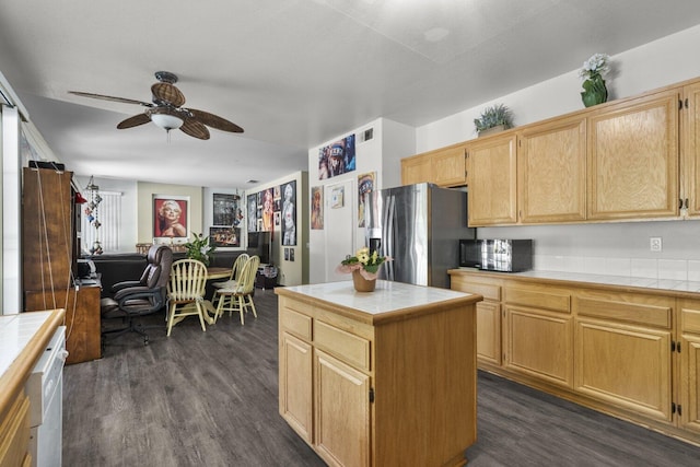 42164 Valley Vista Dr, Lancaster, CA 93536 - kitchen featuring tile countertops, stainless steel fridge with ice dispenser, ceiling fan, and dark wood finished floors