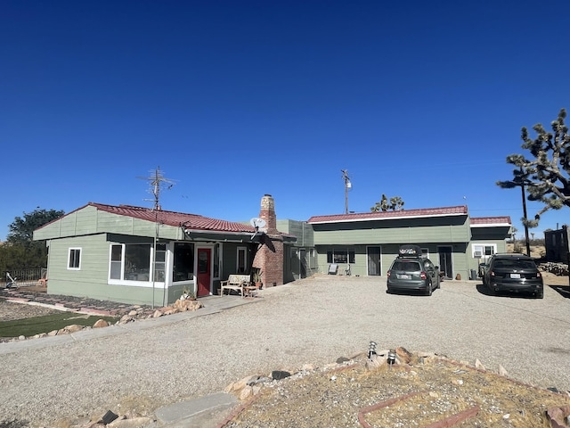 view of front facade with a carport