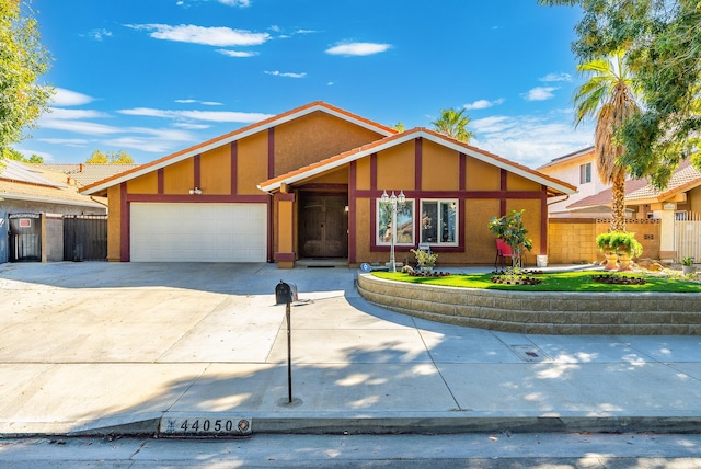 view of front of property with a garage