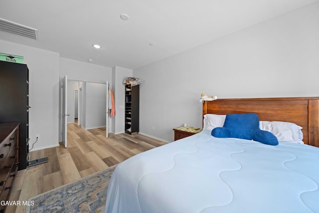 3432 Andrew Ave, Rosamond, CA 93560 - bedroom with light wood-type flooring and recessed lighting