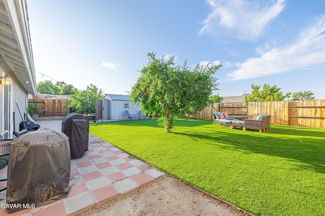 37388 Harrow Ct, Palmdale, CA 93550 - fenced backyard featuring a patio area, a storage shed, and an outdoor hangout area