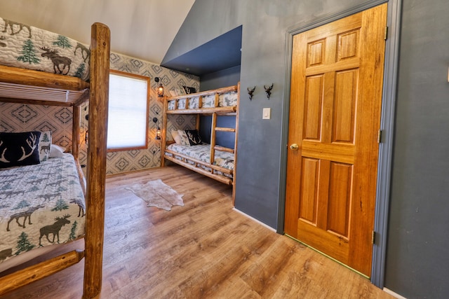 bedroom with hardwood / wood-style floors