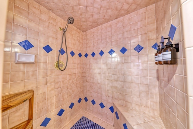 bathroom featuring tiled shower