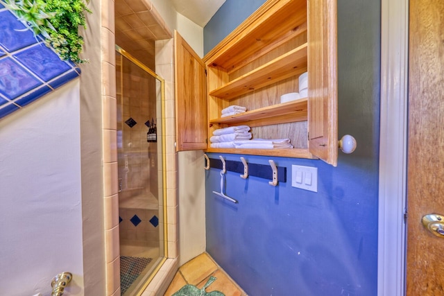 bathroom with an enclosed shower