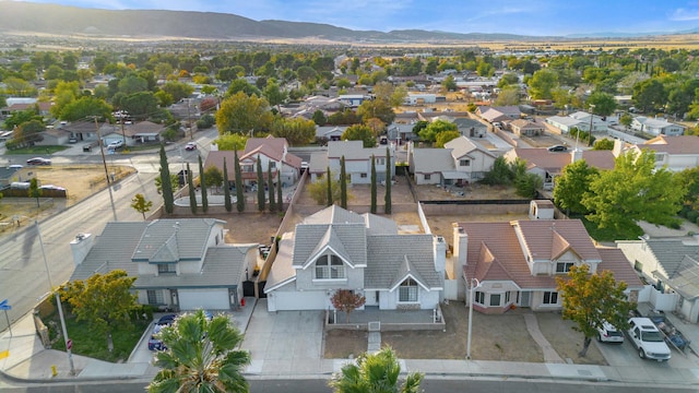 bird's eye view featuring a residential view and a mountain view