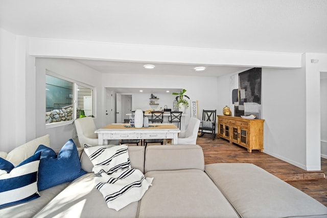 living area featuring dark wood-style flooring, recessed lighting, and baseboards