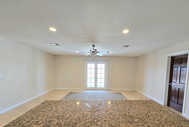 empty room with visible vents, recessed lighting, baseboards, and a ceiling fan