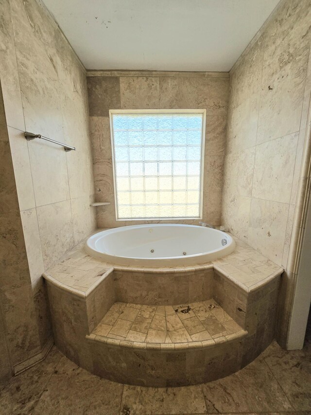 full bath featuring  shower combination, tile patterned floors, and vanity