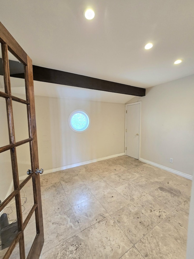 empty room featuring recessed lighting, baseboards, and beam ceiling