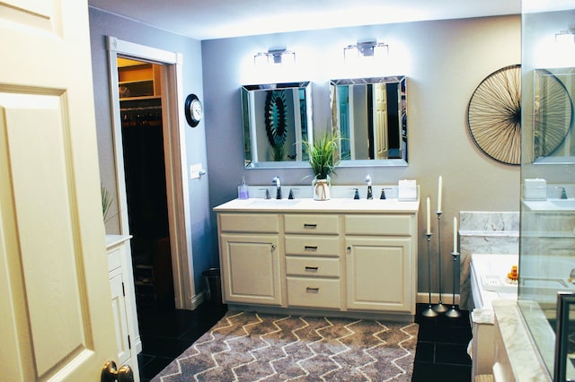 bathroom with a washtub and vanity