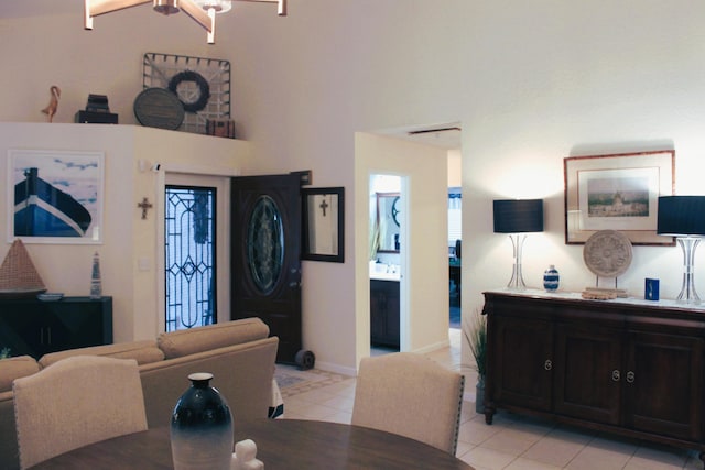 dining area with light tile patterned flooring