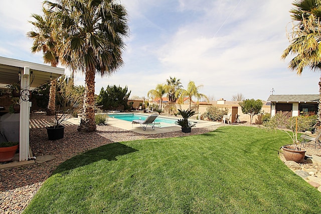 view of yard with a patio, a fenced backyard, and a fenced in pool