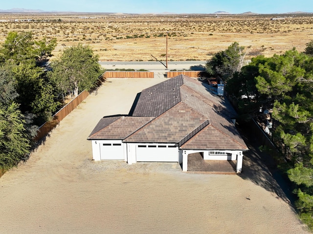 drone / aerial view featuring a mountain view