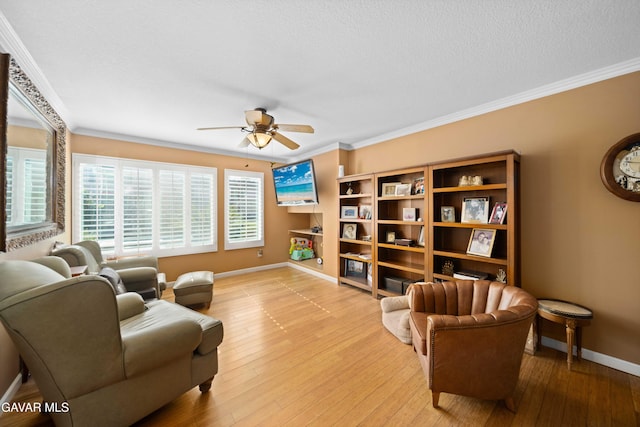 37331 E 57th St, Palmdale, CA 93552 - living area featuring ceiling fan, ornamental molding, light wood-type flooring, and a textured ceiling
