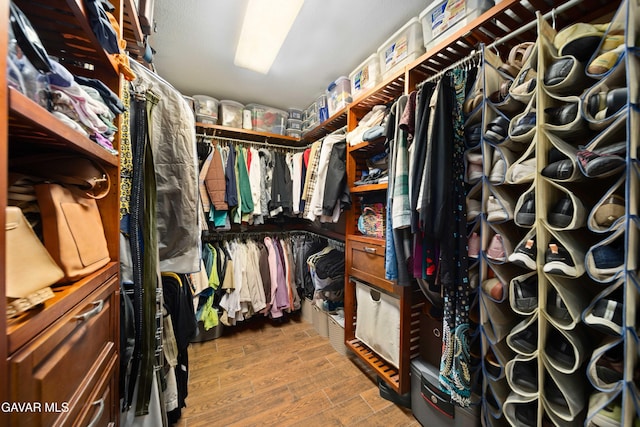 37331 E 57th St, Palmdale, CA 93552 - spacious closet featuring dark wood-style flooring