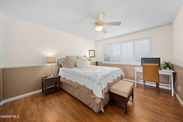 37331 E 57th St, Palmdale, CA 93552 - bedroom with wood finished floors, a ceiling fan, and a desk