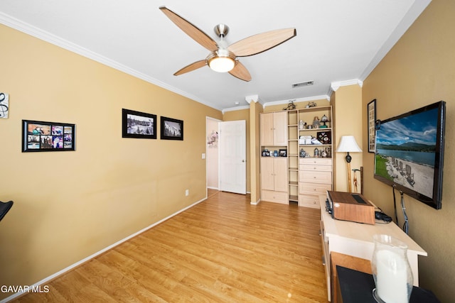 37331 E 57th St, Palmdale, CA 93552 - sitting room with light wood-type flooring, ornamental molding, ceiling fan, and a desk