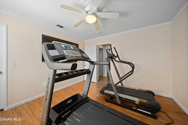 37331 E 57th St, Palmdale, CA 93552 - exercise room featuring wood finished floors, crown molding, and ceiling fan