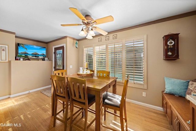 37331 E 57th St, Palmdale, CA 93552 - dining room featuring light wood-style floors, ceiling fan, and ornamental molding