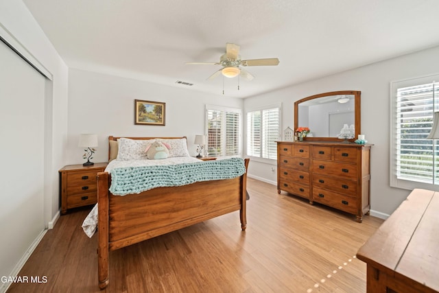 37331 E 57th St, Palmdale, CA 93552 - bedroom featuring light wood-type flooring, ceiling fan, and a closet