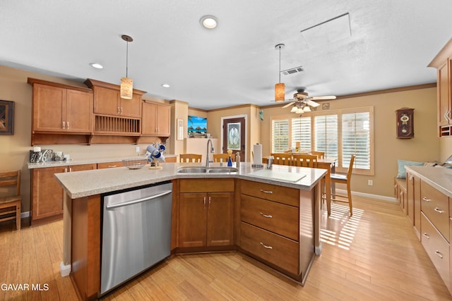 37331 E 57th St, Palmdale, CA 93552 - kitchen with dishwasher, brown cabinetry, decorative light fixtures, light wood-style flooring, and recessed lighting