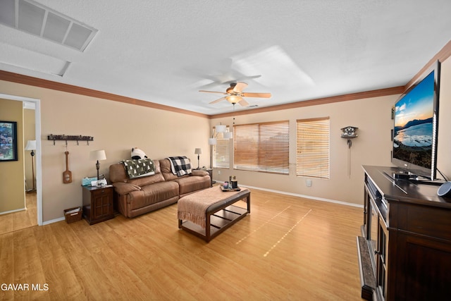 37331 E 57th St, Palmdale, CA 93552 - living room with ceiling fan, ornamental molding, and light wood-type flooring